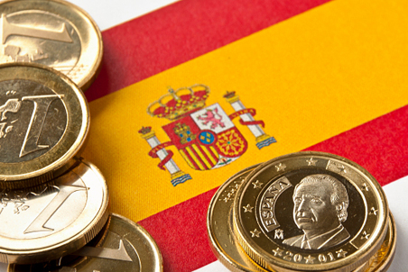 Евро и флаг Испании
